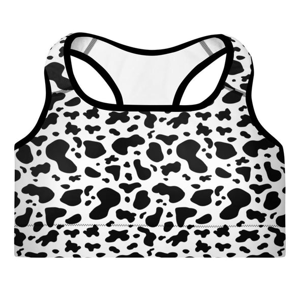 mockup of a cow print sports bra with black shoulder straps